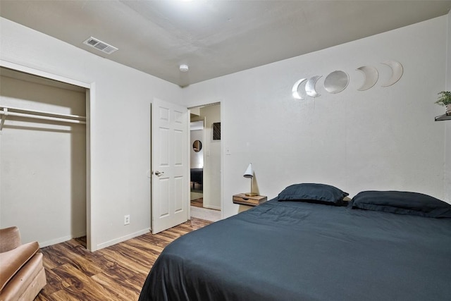 2503 Parker Ln Unit A & B, Austin, TX 78741 - bedroom featuring wood finished floors and baseboards