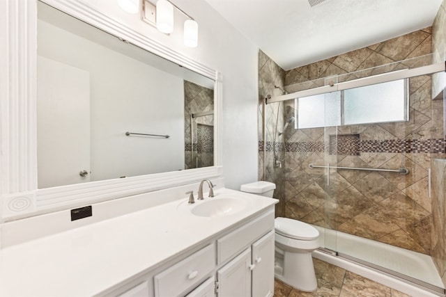 8511 Slant Oak Dr, Austin, TX 78729 - bathroom featuring vanity and a stall shower