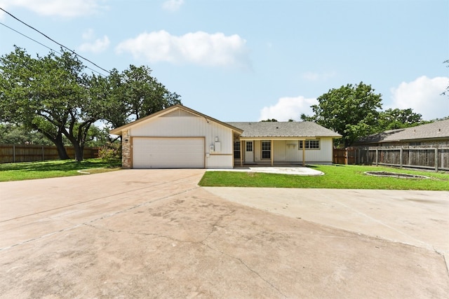 8511 Slant Oak Dr, Austin, TX 78729 - ranch-style house with driveway and a garage