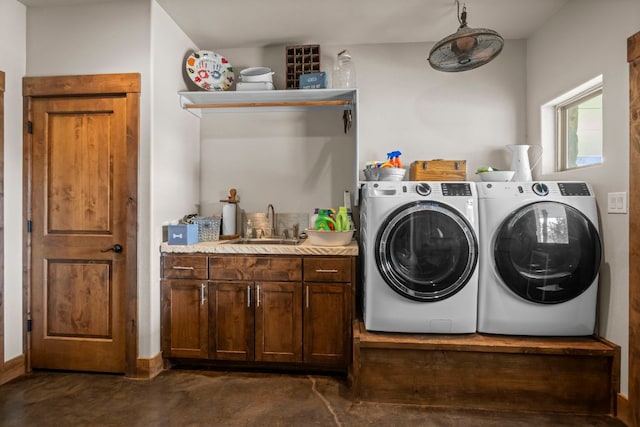 201 N Oak Vista Dr, Burnet, TX 78611 - washroom with washing machine and dryer and cabinet space