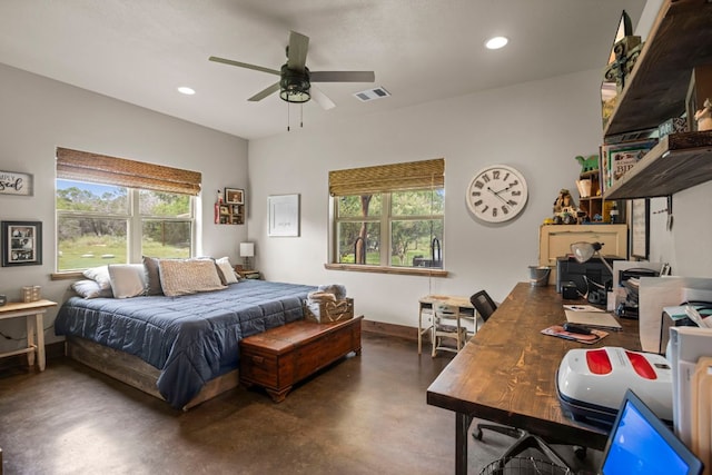 201 N Oak Vista Dr, Burnet, TX 78611 - bedroom with finished concrete flooring, recessed lighting, and a desk