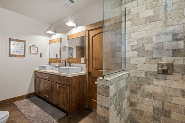 201 N Oak Vista Dr, Burnet, TX 78611 - bathroom with double vanity and walk in shower