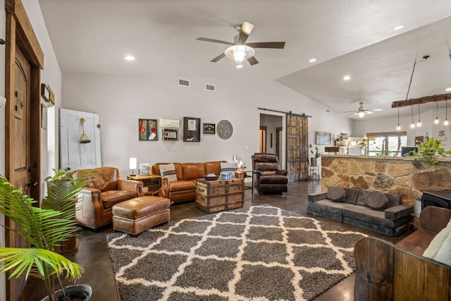 201 N Oak Vista Dr, Burnet, TX 78611 - living area with ceiling fan, a barn door, lofted ceiling, concrete flooring, and recessed lighting