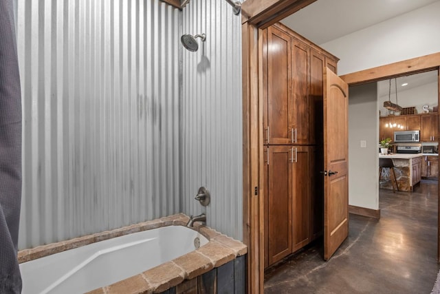 201 N Oak Vista Dr, Burnet, TX 78611 - full bathroom with finished concrete flooring and tub / shower combination