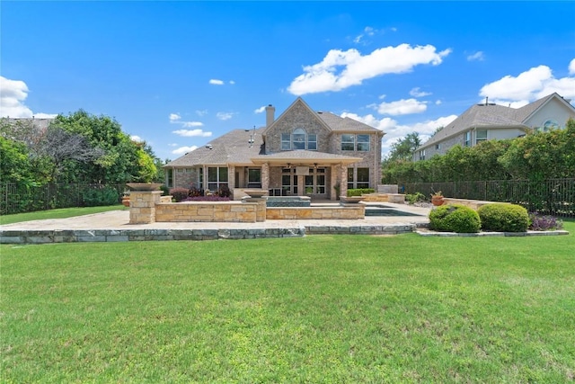 15208 Sunningdale St, Austin, TX 78717 - rear view of house with a chimney, brick siding, ceiling fan, and a patio