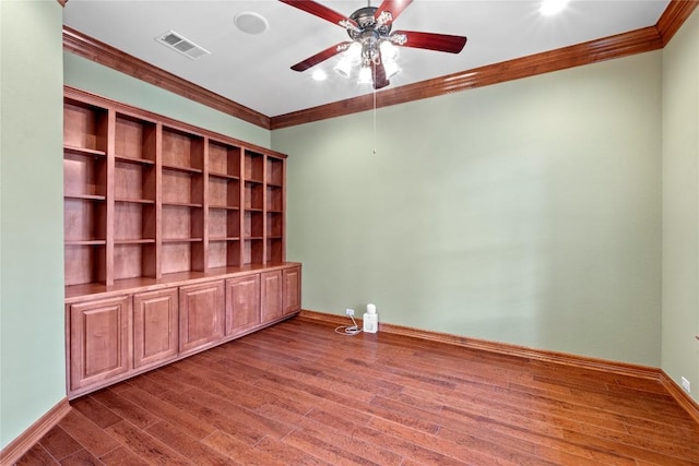 15208 Sunningdale St, Austin, TX 78717 - empty room featuring crown molding, a ceiling fan, and wood finished floors