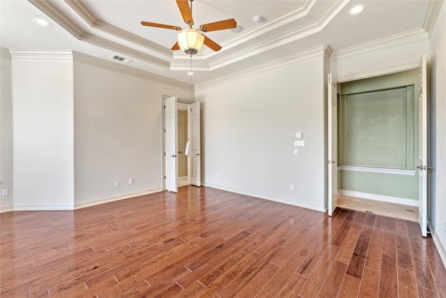15208 Sunningdale St, Austin, TX 78717 - unfurnished bedroom featuring a raised ceiling, crown molding, wood finished floors, recessed lighting, and a ceiling fan