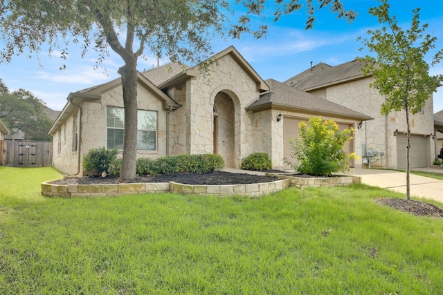 11017 Casitas Dr, Austin, TX 78717 - view of front of home with stone siding, a garage, roof with shingles, and driveway