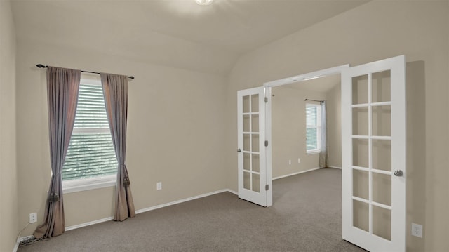 11017 Casitas Dr, Austin, TX 78717 - unfurnished room with french doors, carpet, and lofted ceiling