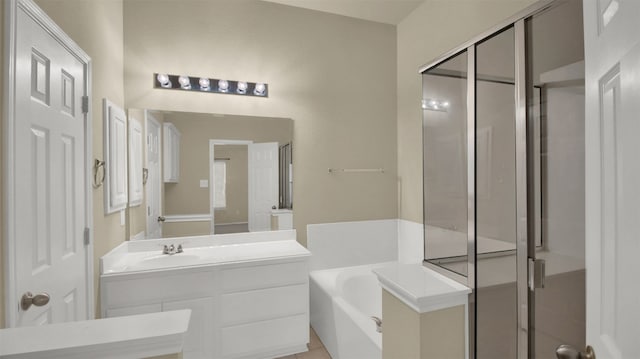 11017 Casitas Dr, Austin, TX 78717 - bathroom featuring a bath, vanity, and an enclosed shower