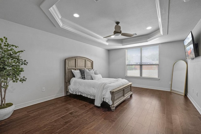 100 Eagle Landing Dr, Belton, TX 76513 - bedroom featuring a raised ceiling, crown molding, dark wood-type flooring, and ceiling fan