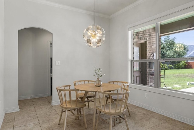 100 Eagle Landing Dr, Belton, TX 76513 - dining area with arched walkways, ornamental molding, light tile patterned floors, and a chandelier