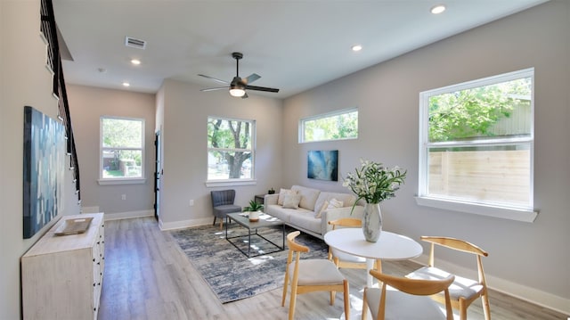 6111 Carnation Ter Unit 1, Austin, TX 78741 - living room featuring light wood-style flooring, recessed lighting, and ceiling fan