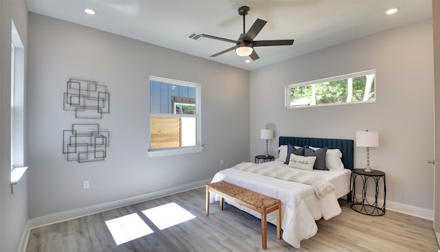 6111 Carnation Ter Unit 1, Austin, TX 78741 - bedroom featuring wood finished floors, recessed lighting, and a ceiling fan