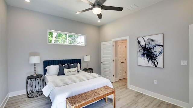 6111 Carnation Ter Unit 1, Austin, TX 78741 - bedroom featuring light wood-style floors, recessed lighting, and a ceiling fan