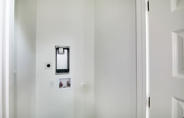 6111 Carnation Ter Unit 1, Austin, TX 78741 - laundry area with electric dryer hookup and washer hookup