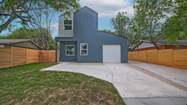 6111 Carnation Ter Unit 1, Austin, TX 78741 - detached garage featuring concrete driveway