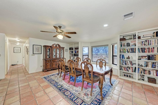 817 Mountain Creek Rd, Marble Falls, TX 78654 - dining room with a ceiling fan and light tile patterned floors