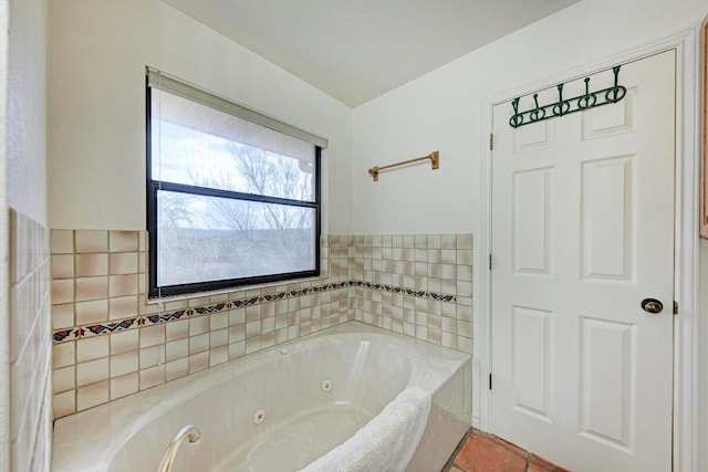 817 Mountain Creek Rd, Marble Falls, TX 78654 - full bathroom featuring a jetted tub and tile patterned floors