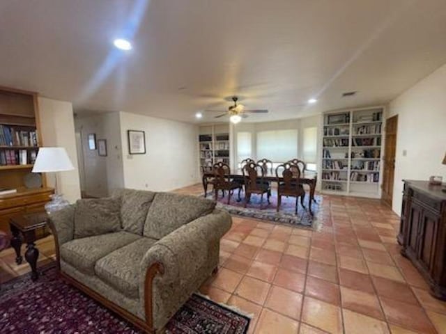 817 Mountain Creek Rd, Marble Falls, TX 78654 - living room featuring ceiling fan, light tile patterned flooring, recessed lighting, and built in features