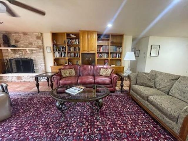 817 Mountain Creek Rd, Marble Falls, TX 78654 - living room with a ceiling fan and a fireplace