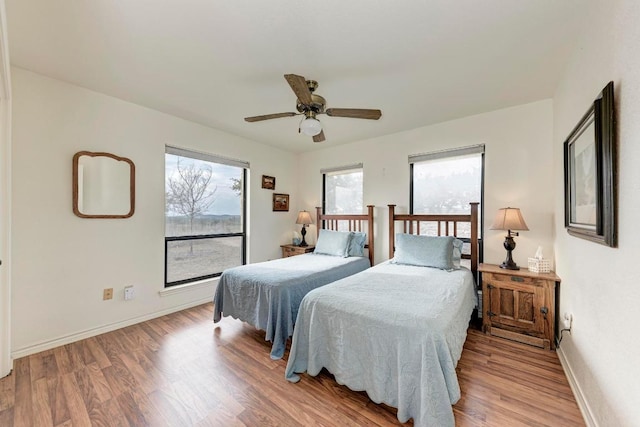 817 Mountain Creek Rd, Marble Falls, TX 78654 - bedroom with light wood-style flooring and a ceiling fan