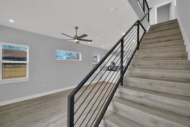 1104 Begonia Ter Unit 2, Austin, TX 78741 - staircase featuring wood finished floors, ceiling fan, and recessed lighting