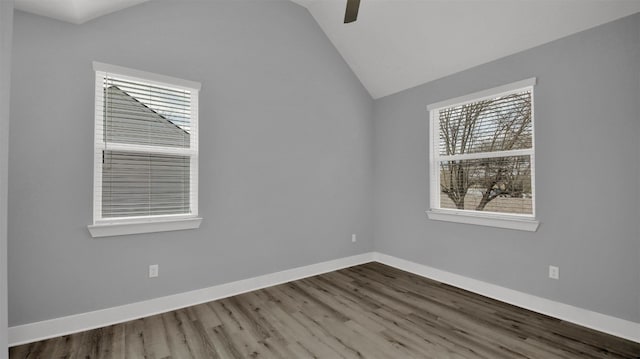 1104 Begonia Ter Unit 2, Austin, TX 78741 - empty room featuring plenty of natural light, wood finished floors, vaulted ceiling, and a ceiling fan