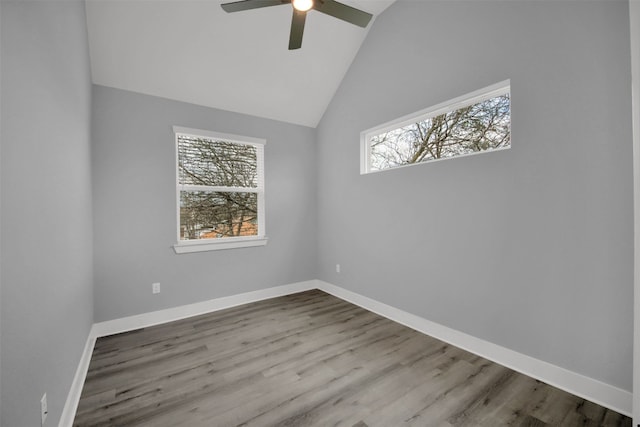 1104 Begonia Ter Unit 2, Austin, TX 78741 - empty room featuring a ceiling fan, vaulted ceiling, and wood finished floors