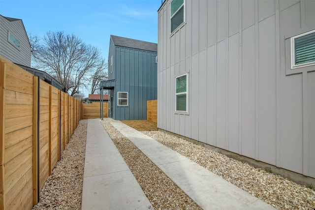1104 Begonia Ter Unit 2, Austin, TX 78741 - view of side of property featuring board and batten siding