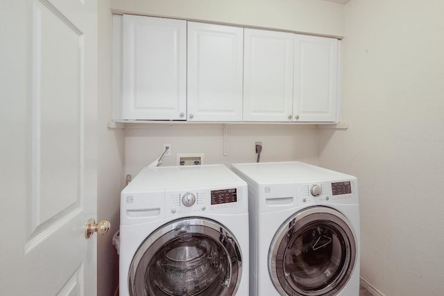 15433 Ozone Pl, Austin, TX 78728 - washroom featuring independent washer and dryer and cabinet space