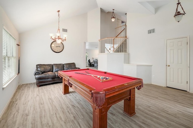 15433 Ozone Pl, Austin, TX 78728 - recreation room with a chandelier, high vaulted ceiling, billiards table, and wood finished floors