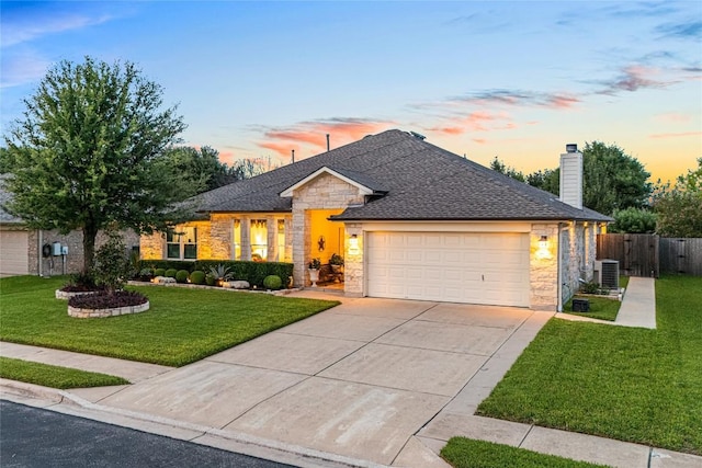 700 Stokesay Castle Path, Pflugerville, TX 78660 - ranch-style home with a garage, a shingled roof, driveway, a chimney, and stone siding