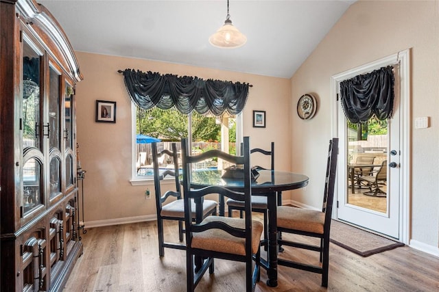 700 Stokesay Castle Path, Pflugerville, TX 78660 - dining room with light wood-style flooring and lofted ceiling