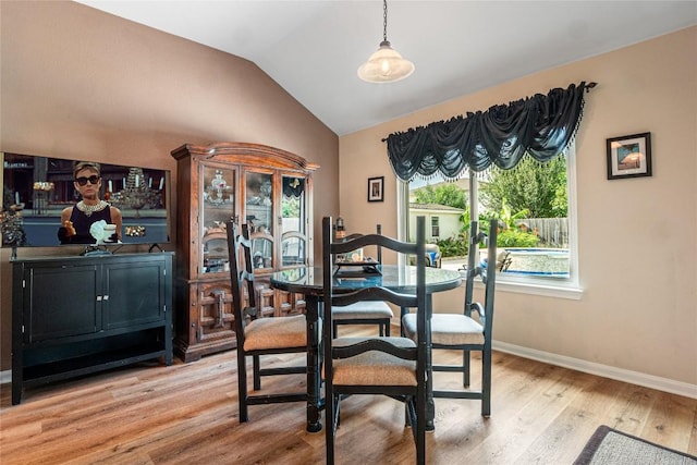 700 Stokesay Castle Path, Pflugerville, TX 78660 - dining space with vaulted ceiling and light wood-type flooring