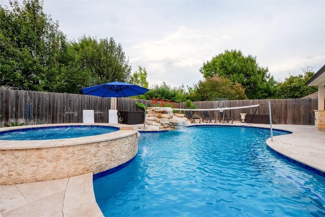 700 Stokesay Castle Path, Pflugerville, TX 78660 - view of pool with a fenced backyard, a patio, and a pool with connected hot tub