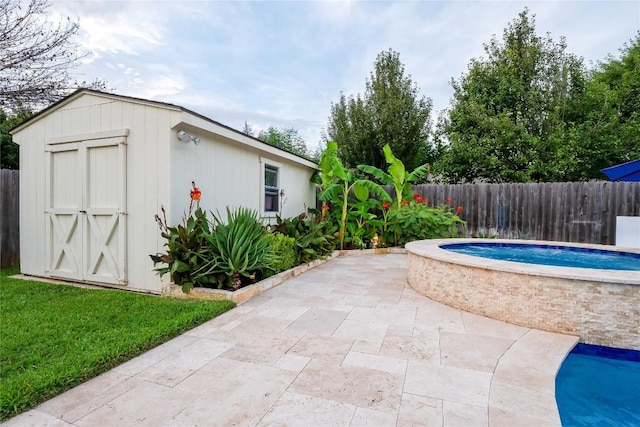 700 Stokesay Castle Path, Pflugerville, TX 78660 - view of swimming pool with a fenced backyard, a patio area, and a storage shed