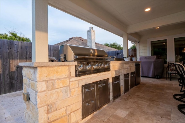 700 Stokesay Castle Path, Pflugerville, TX 78660 - view of patio / terrace featuring exterior kitchen