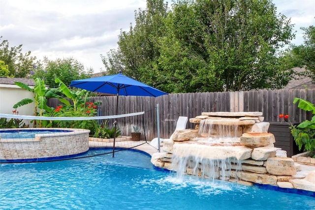 700 Stokesay Castle Path, Pflugerville, TX 78660 - view of swimming pool featuring a pool with connected hot tub
