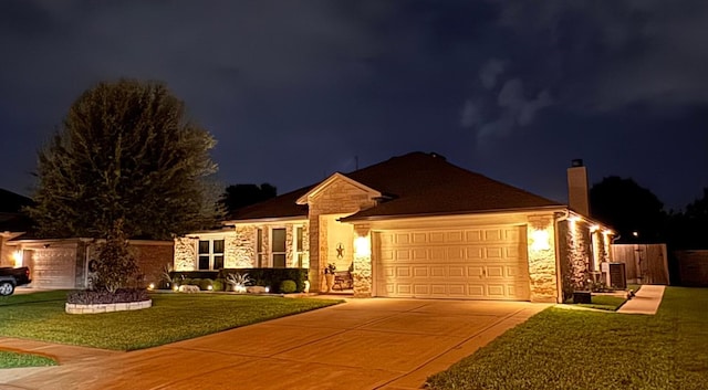 700 Stokesay Castle Path, Pflugerville, TX 78660 - single story home with an attached garage, driveway, stone siding, a chimney, and a lawn