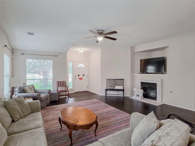 11704 Fletcher Hall Ln, Austin, TX 78717 - living room featuring plenty of natural light, dark wood-type flooring, ceiling fan, and a glass covered fireplace
