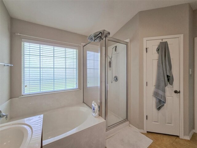 11704 Fletcher Hall Ln, Austin, TX 78717 - bathroom with a shower stall, a bath, and tile patterned flooring