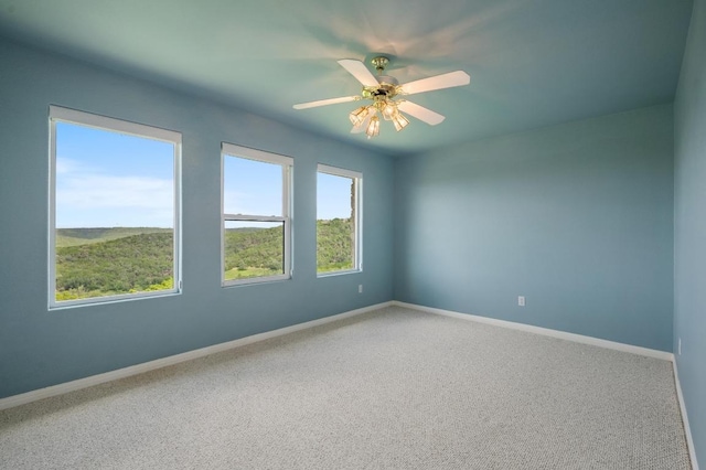 4700 River Place Blvd Unit 3, Austin, TX 78730 - carpeted empty room with baseboards and ceiling fan
