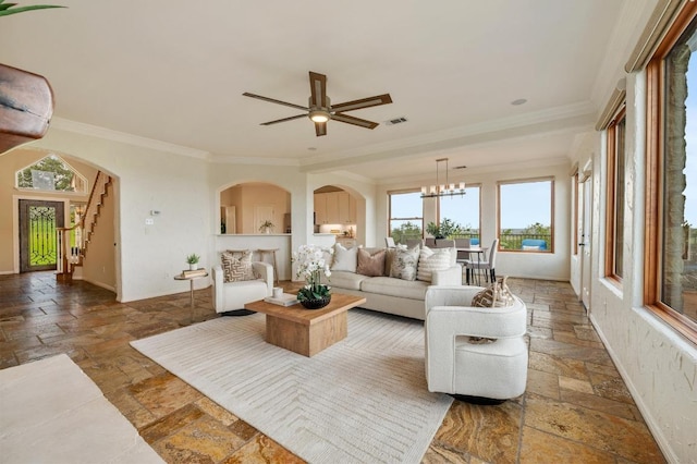 4700 River Place Blvd Unit 3, Austin, TX 78730 - living room with stone tile floors, plenty of natural light, ornamental molding, and ceiling fan