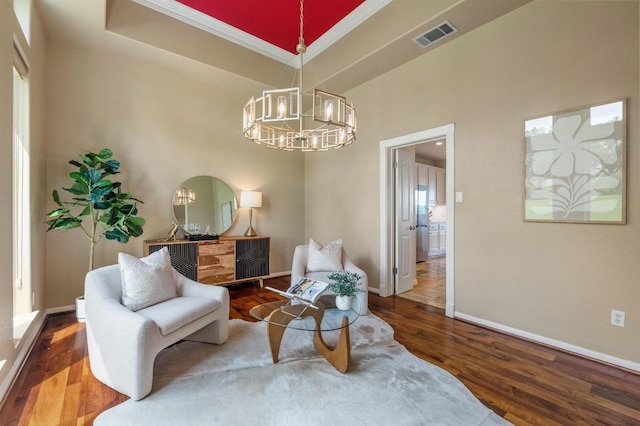 4700 River Place Blvd Unit 3, Austin, TX 78730 - living area with wood finished floors, crown molding, and a chandelier