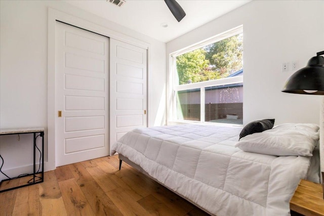 2902 Gonzales St Unit 2, Austin, TX 78702 - bedroom featuring light wood finished floors, a closet, and a ceiling fan
