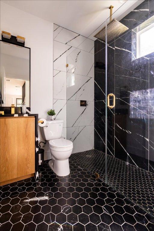 2902 Gonzales St Unit 2, Austin, TX 78702 - full bath with a marble finish shower and vanity