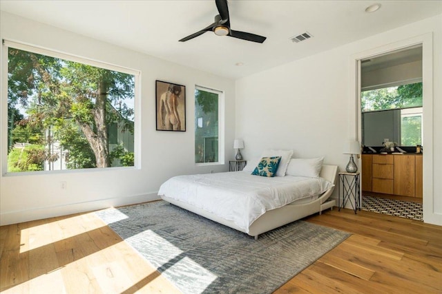 2902 Gonzales St Unit 2, Austin, TX 78702 - bedroom with wood finished floors and ceiling fan