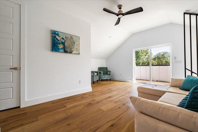 2902 Gonzales St Unit 2, Austin, TX 78702 - living area featuring a ceiling fan, wood finished floors, and vaulted ceiling