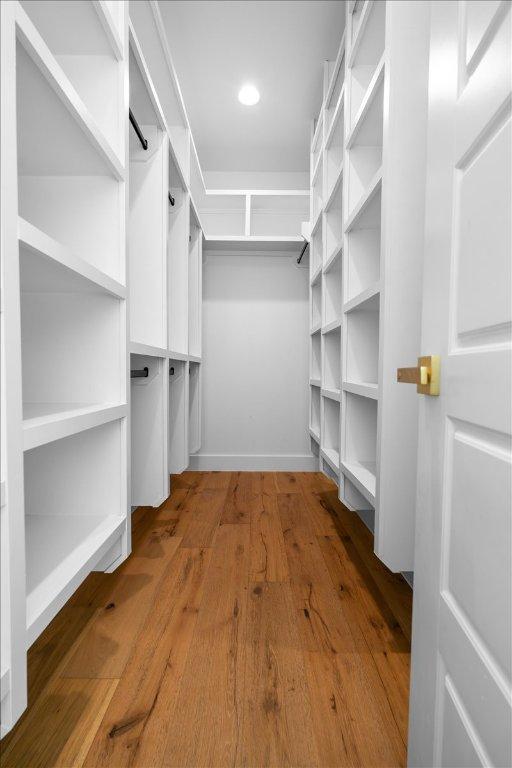 2902 Gonzales St Unit 2, Austin, TX 78702 - spacious closet with wood finished floors